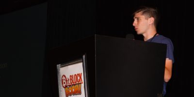 Photo og Michael Goldstein Presenting at BitBlockBoom conference
